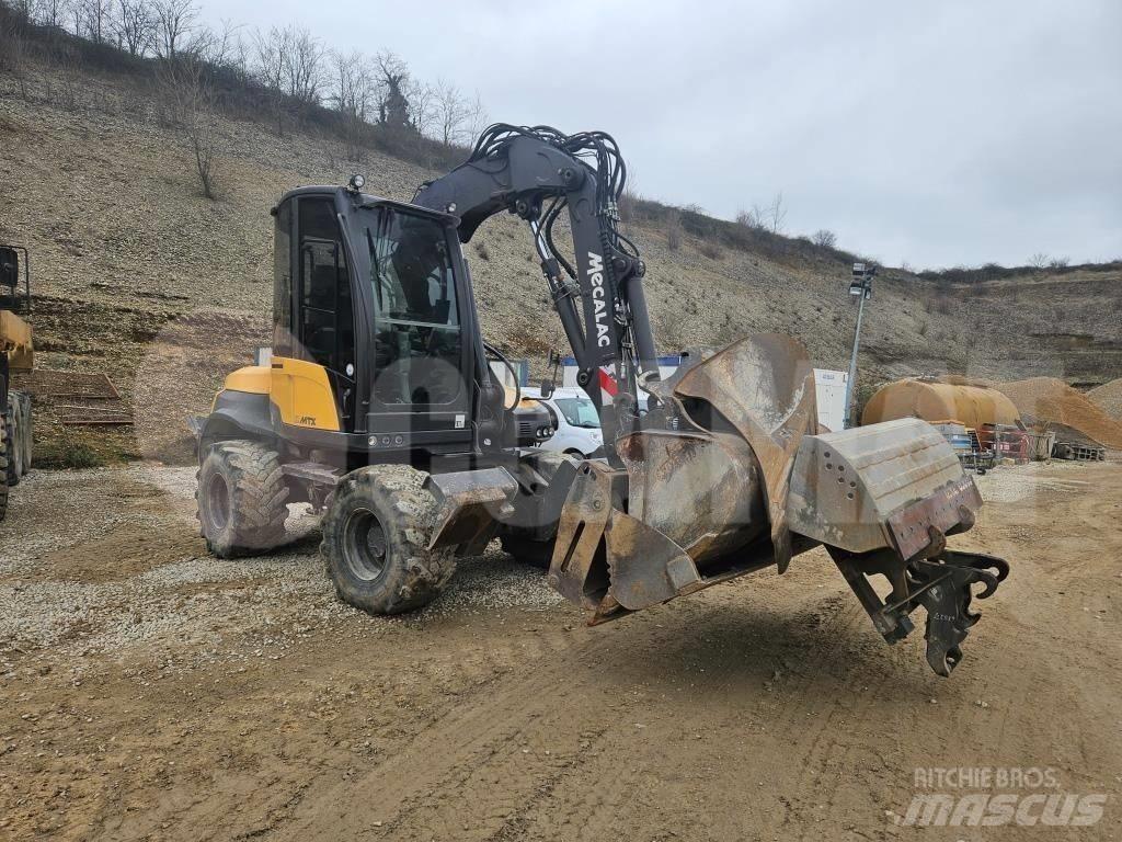 Mecalac 12 M TX  휠 굴삭기