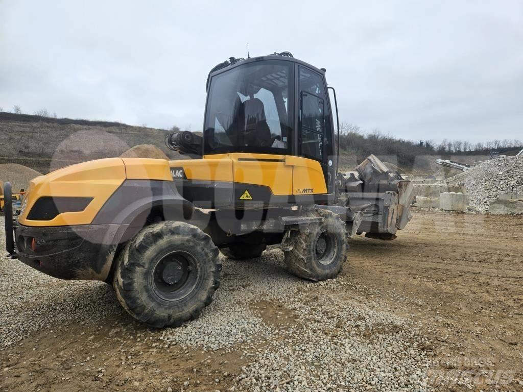 Mecalac 12 M TX  휠 굴삭기