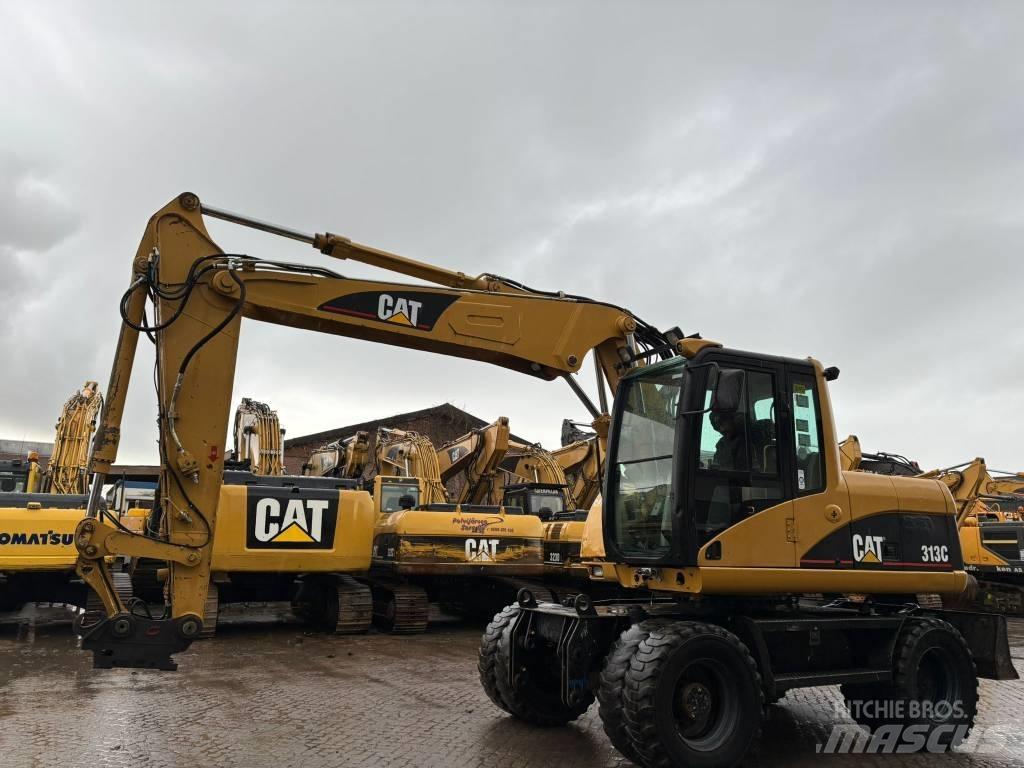 CAT M 313 C  휠 굴삭기