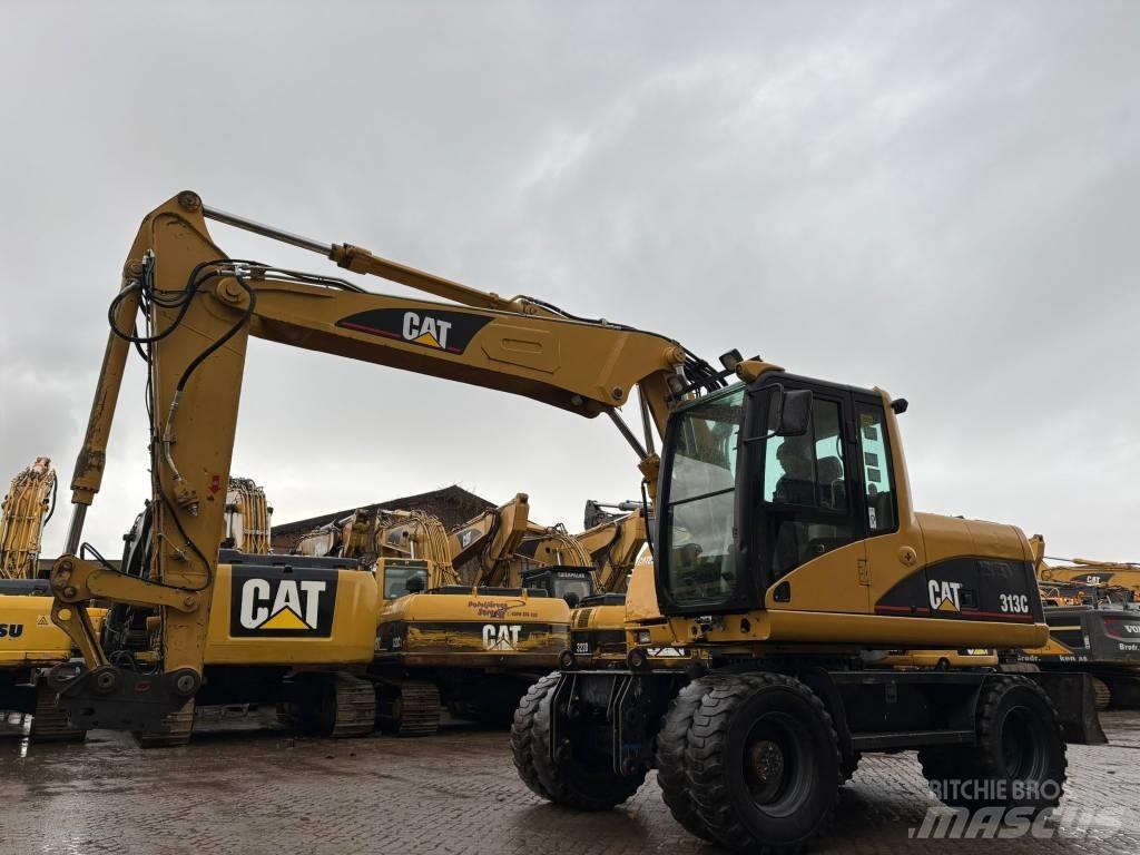 CAT M 313 C  휠 굴삭기