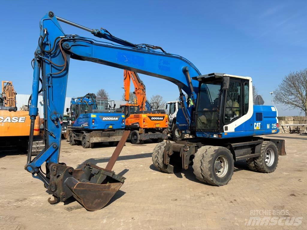CAT M 315  휠 굴삭기