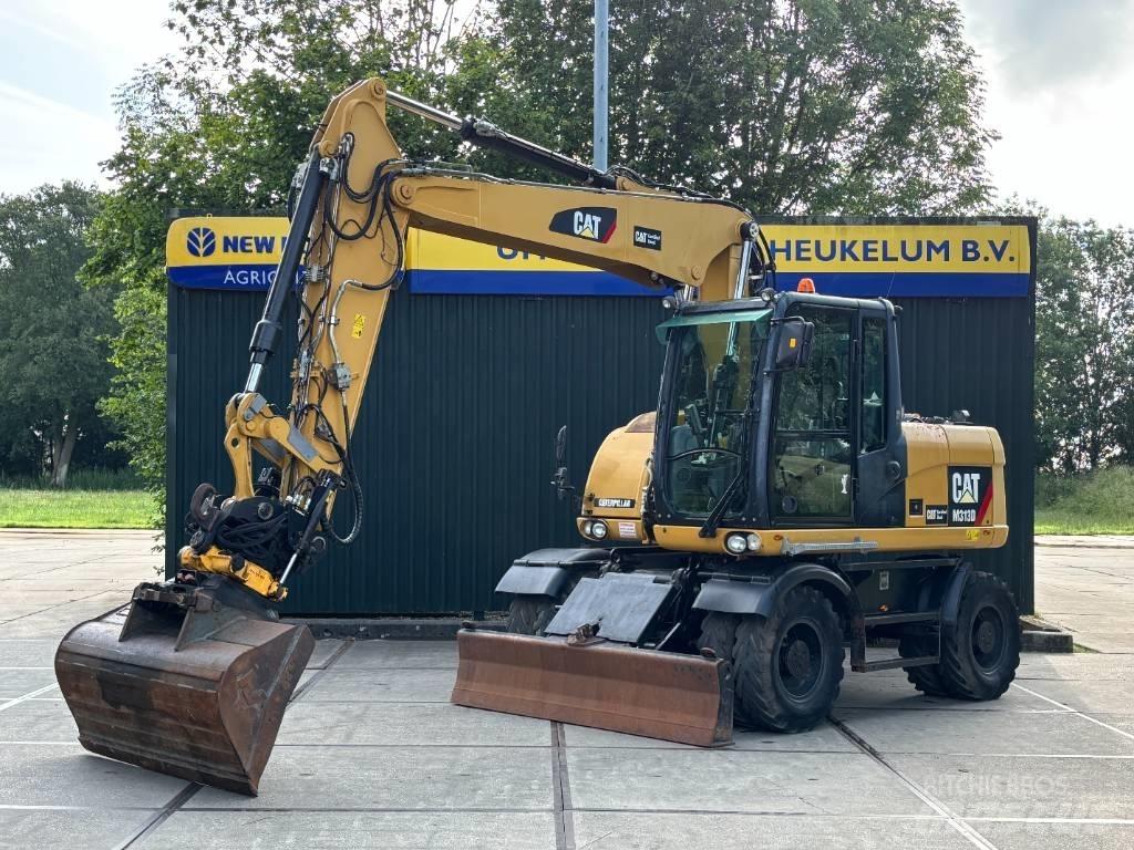 CAT M 313 D  휠 굴삭기