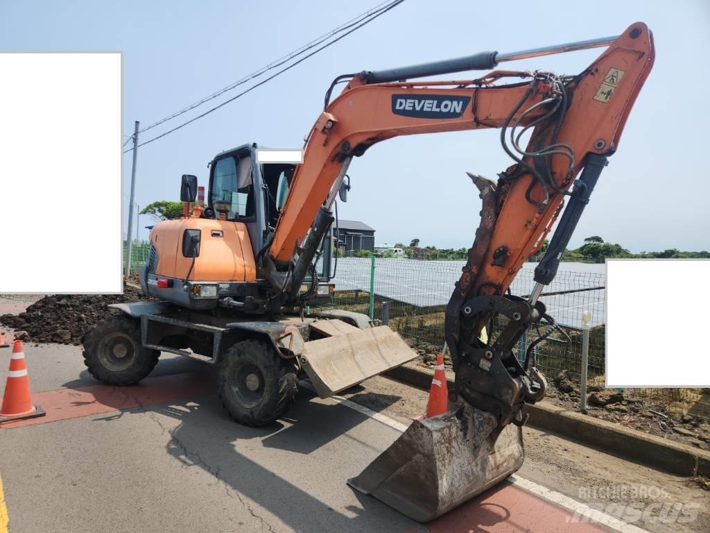 Doosan DX 55 W  휠 굴삭기