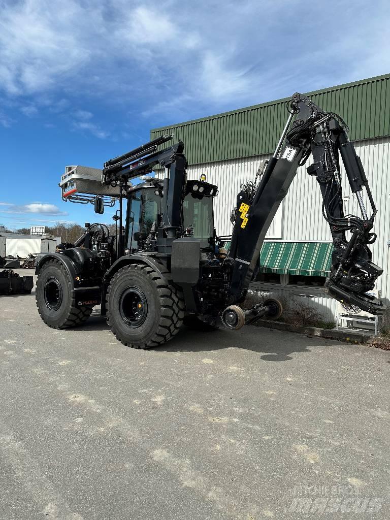 Huddig 1260D Rail 백호로더