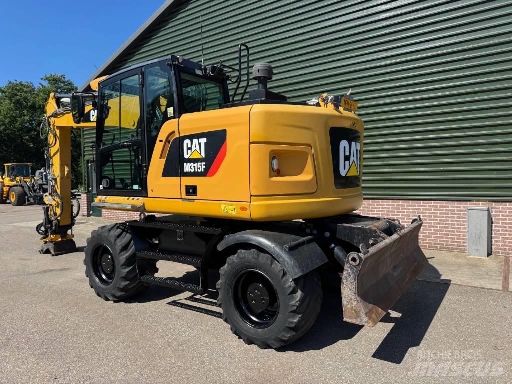 CAT M 315 F  휠 굴삭기