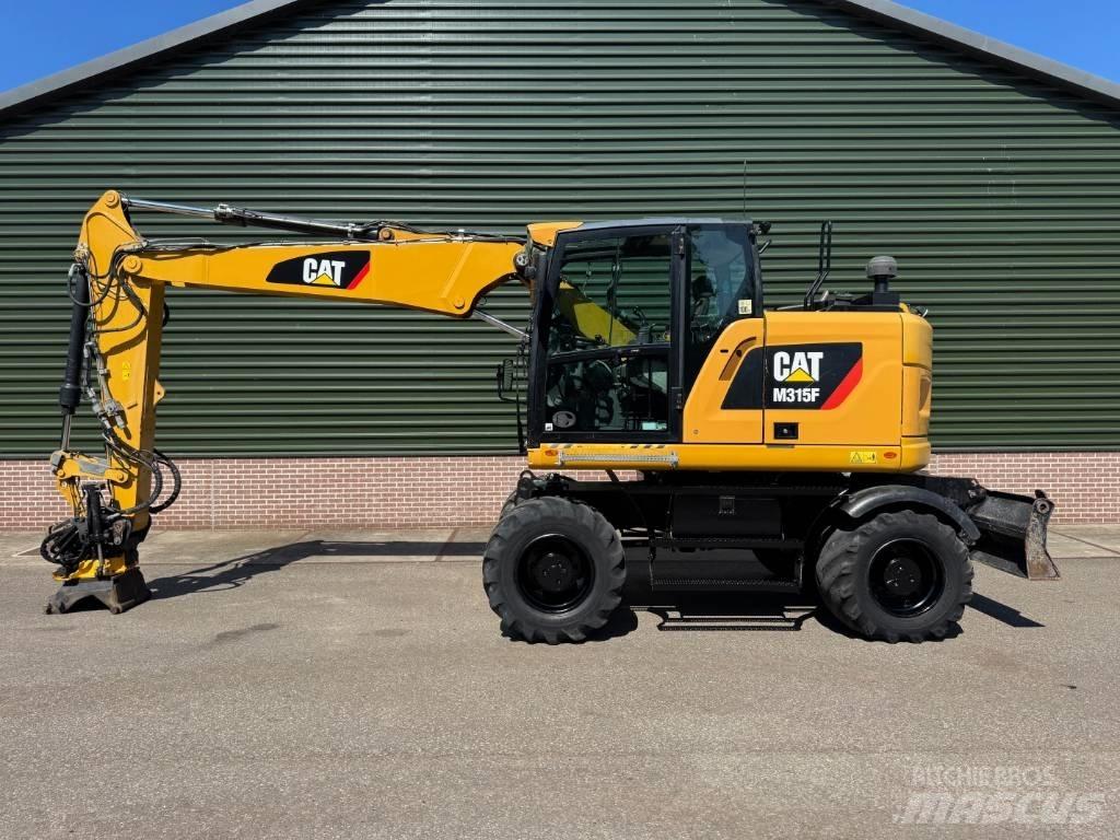 CAT M 315 F  휠 굴삭기