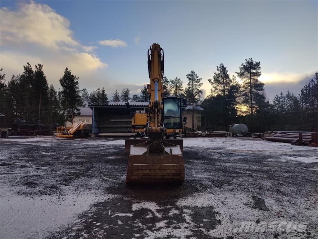 CAT M315  휠 굴삭기