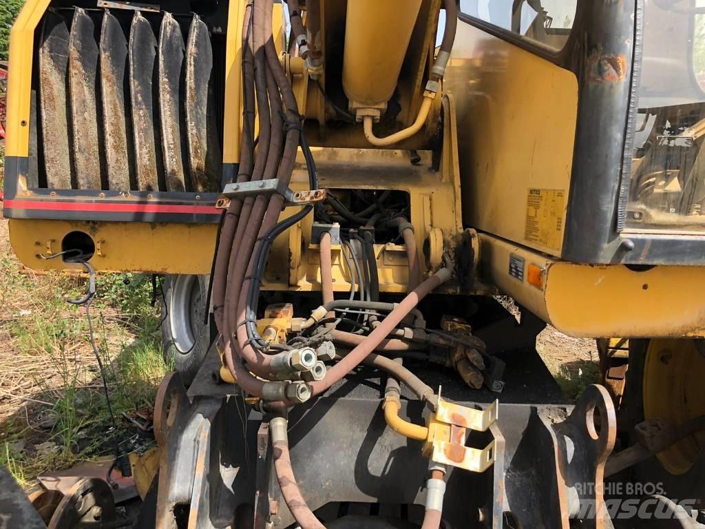 CAT M 312 FOR PARTS  휠 굴삭기