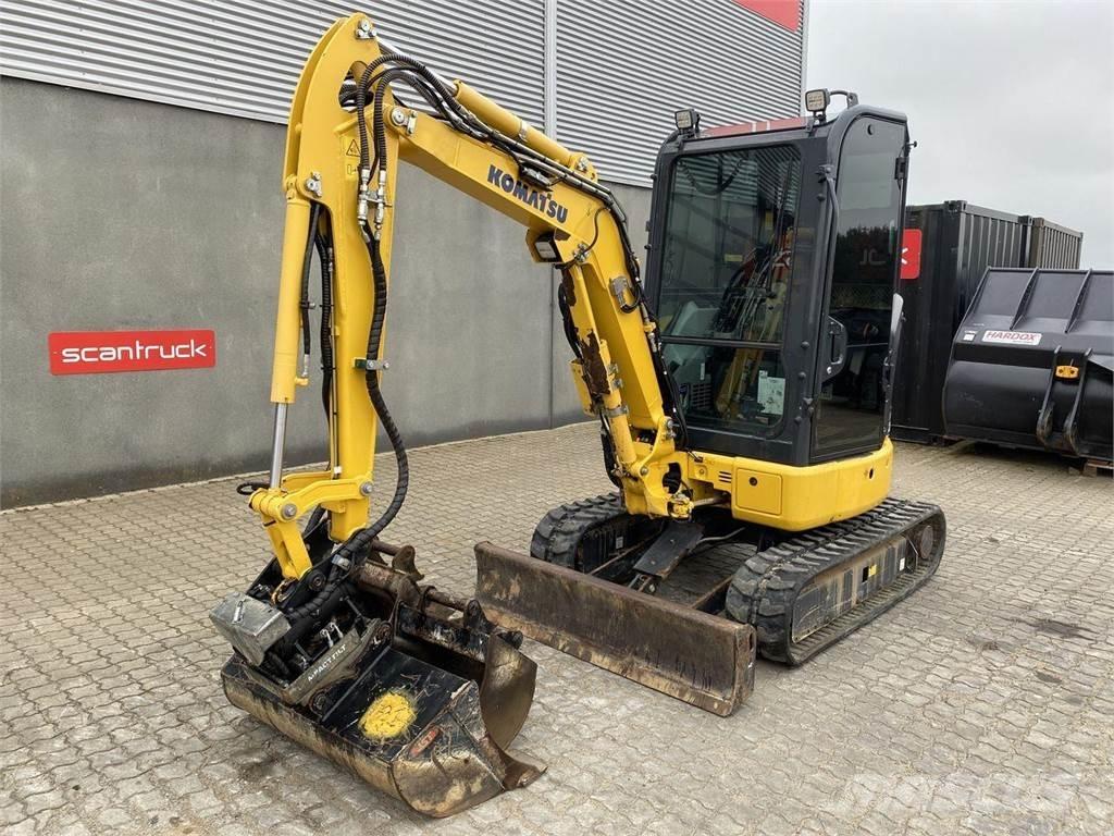 Komatsu PC26MR-5  휠 굴삭기