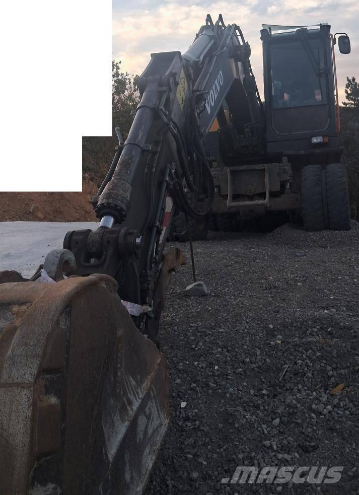 Volvo EW140E  휠 굴삭기