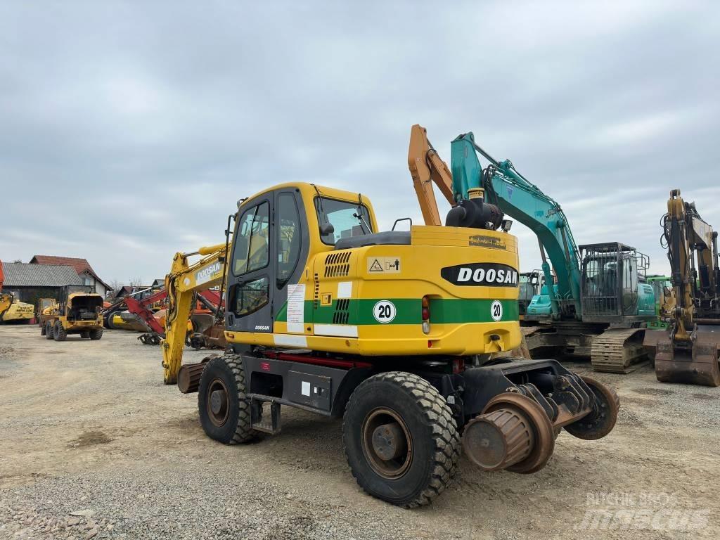 Doosan DX 160 WR  휠 굴삭기