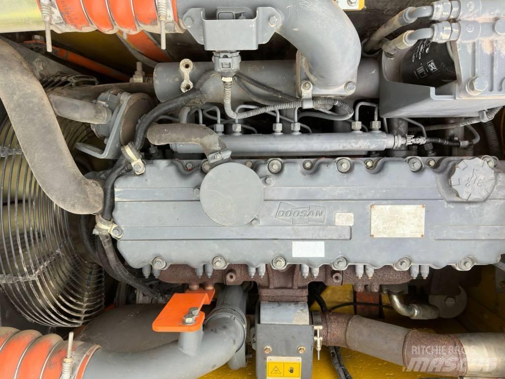 Doosan DX 160 WR  휠 굴삭기