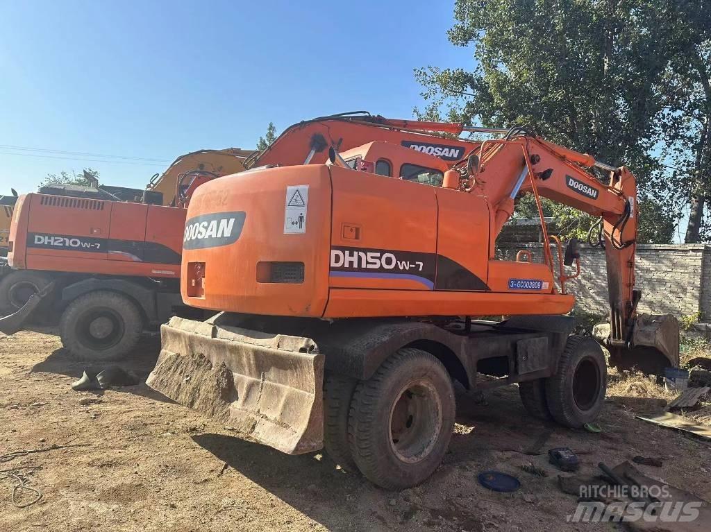 Doosan DH210W  휠 굴삭기