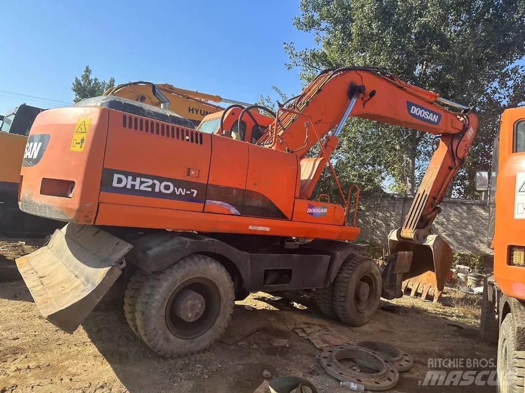 Doosan DH210W  휠 굴삭기