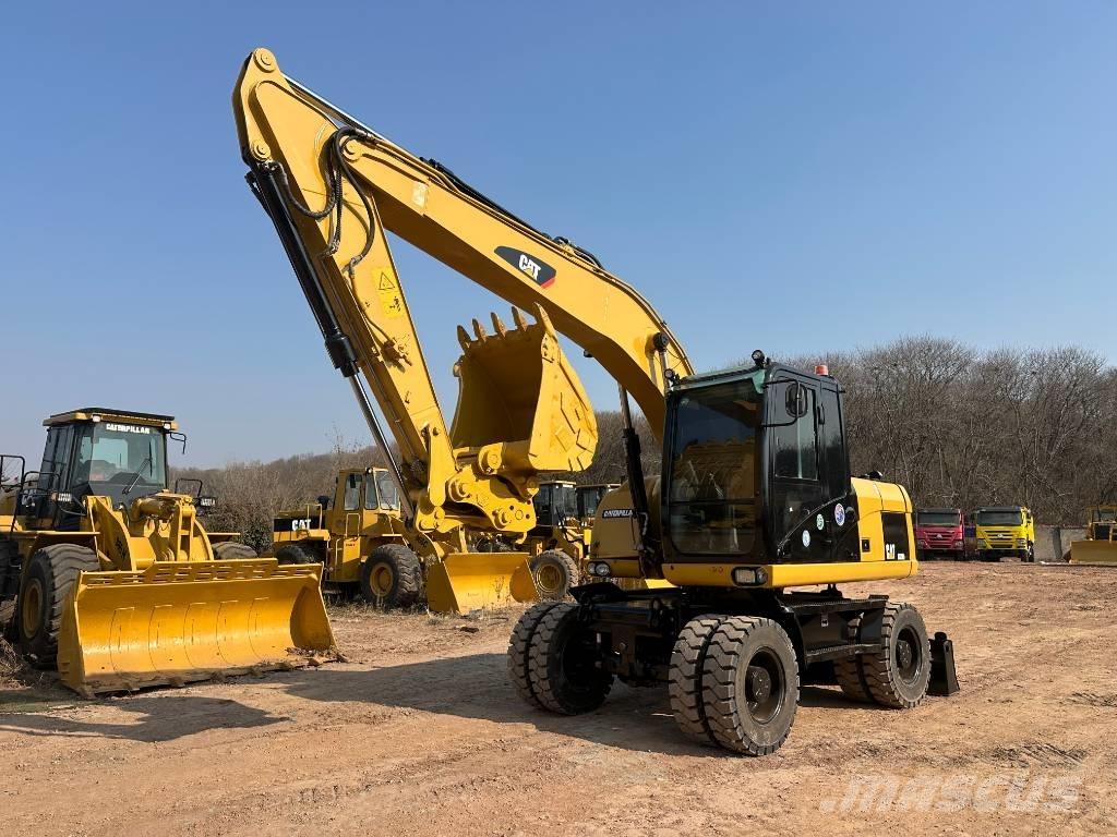 CAT M 320D  휠 굴삭기