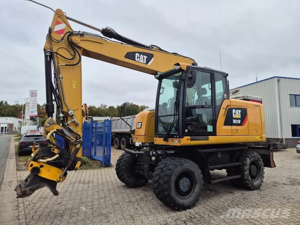 CAT M 318 F  휠 굴삭기