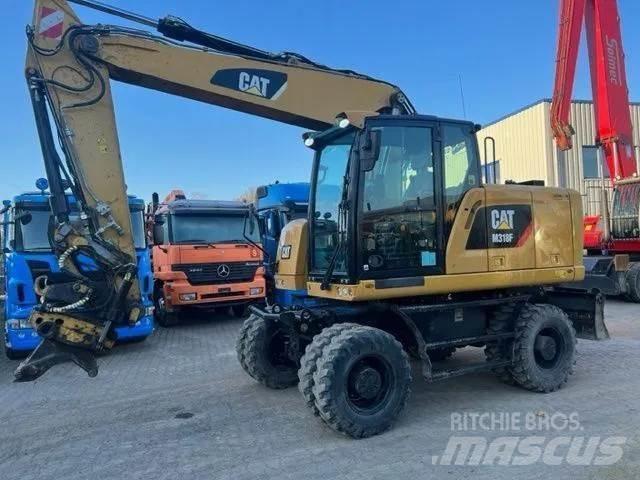 CAT M 318 F  휠 굴삭기