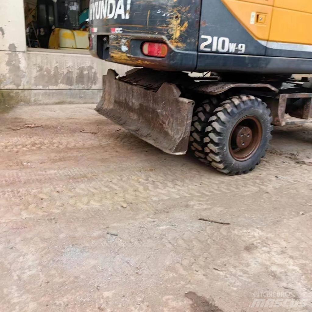Hyundai 210-9  휠 굴삭기