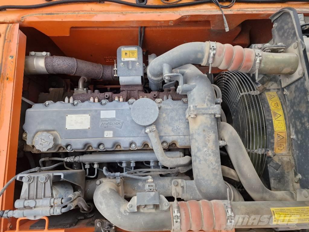 Doosan DX 160 W  휠 굴삭기