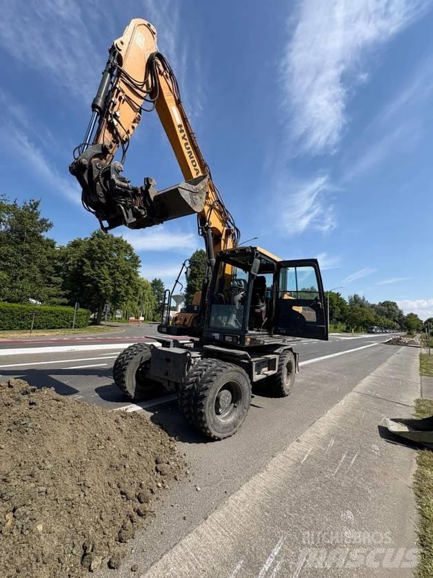 Hyundai HW 140  휠 굴삭기