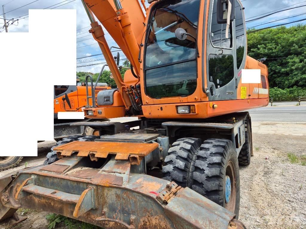 Doosan DX210WA  휠 굴삭기
