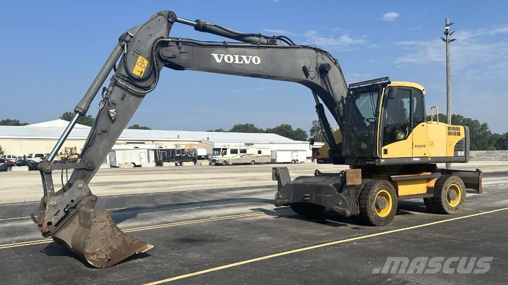 Volvo EW 210 C  휠 굴삭기
