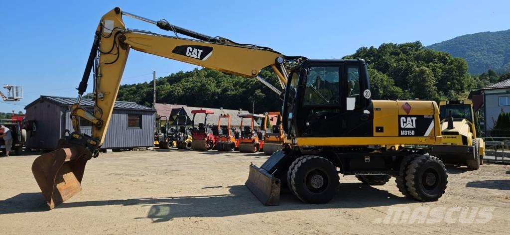 CAT M 315 D  휠 굴삭기