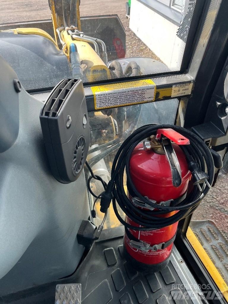 New Holland B 115 B 백호로더