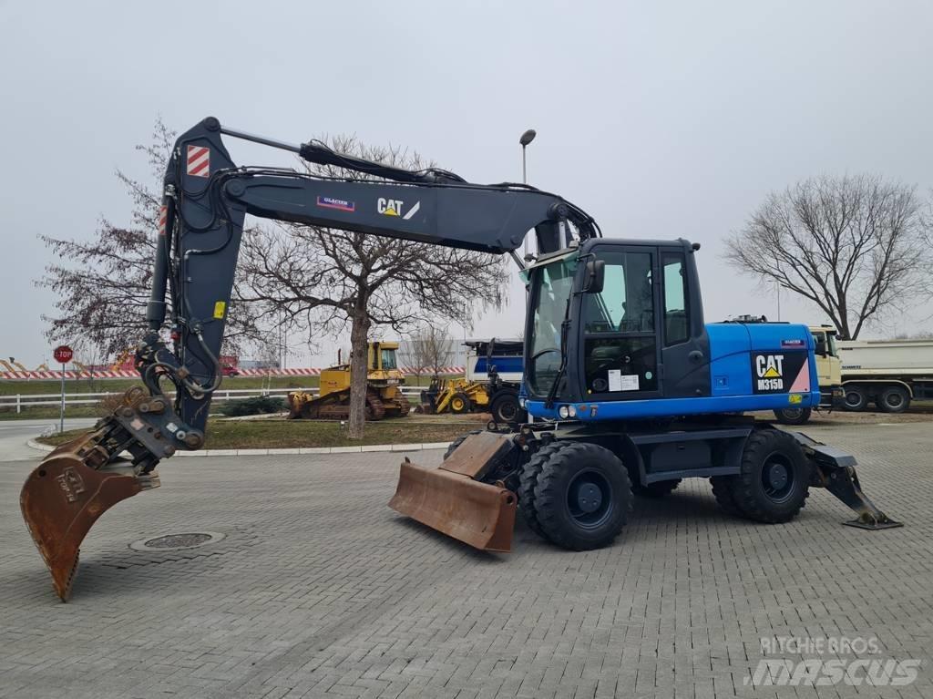CAT M315D 2 buckets  휠 굴삭기
