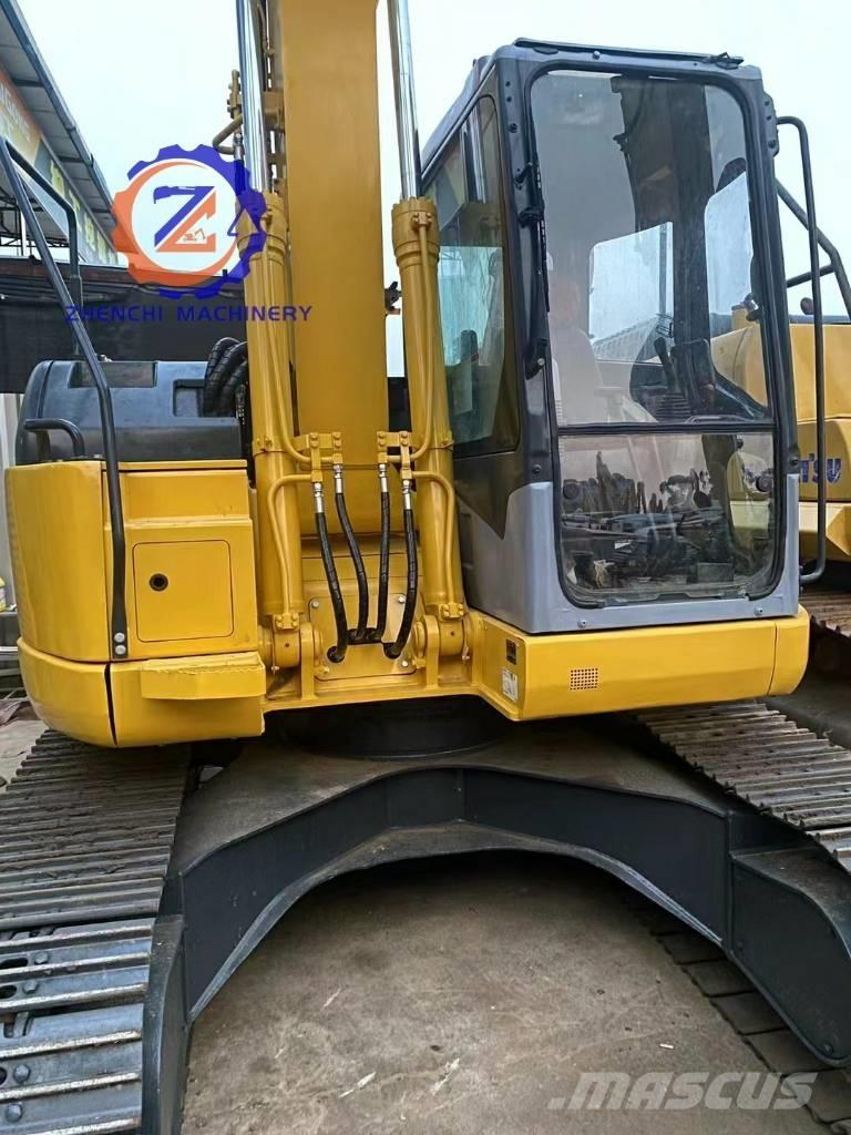 Komatsu PC 128 US 중형굴삭기 7톤-28톤