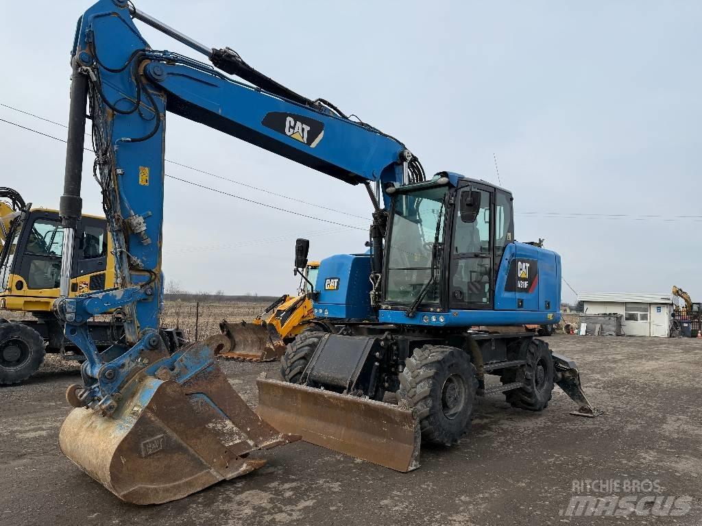 CAT M 318 F  휠 굴삭기