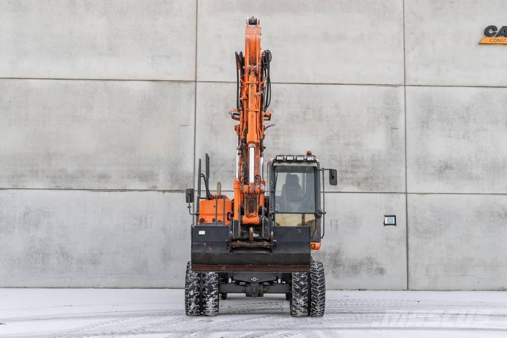 Doosan DX 140 W-3  휠 굴삭기