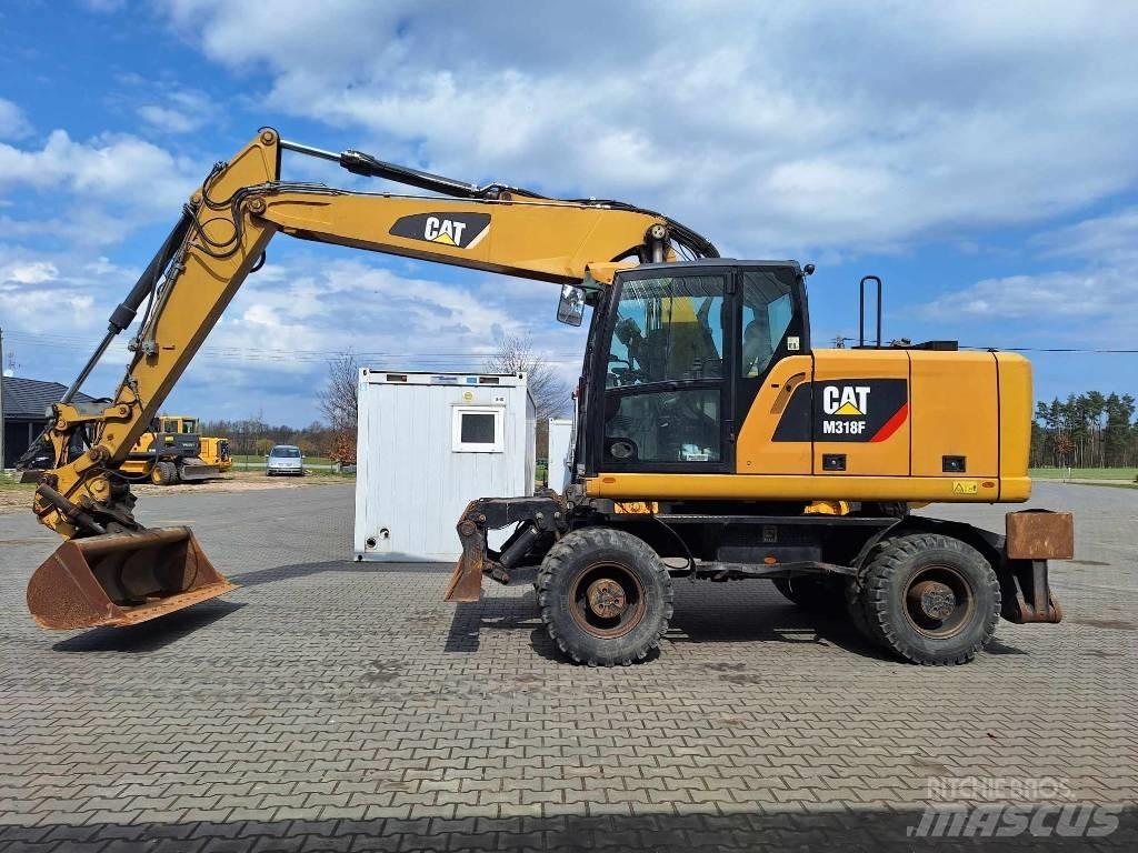 CAT M 318 F  휠 굴삭기