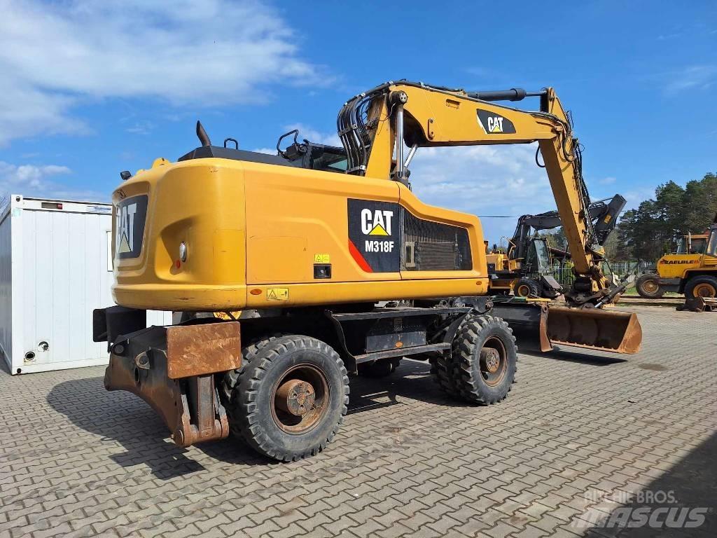 CAT M 318 F  휠 굴삭기
