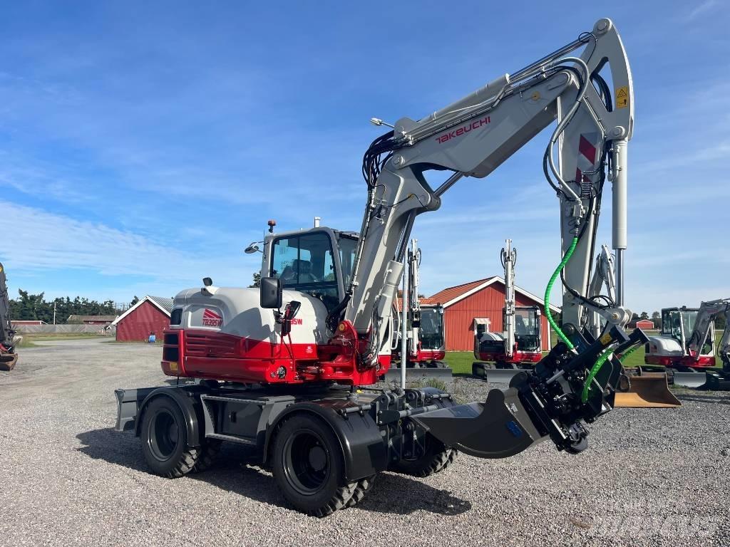 Takeuchi TB 395 W  휠 굴삭기