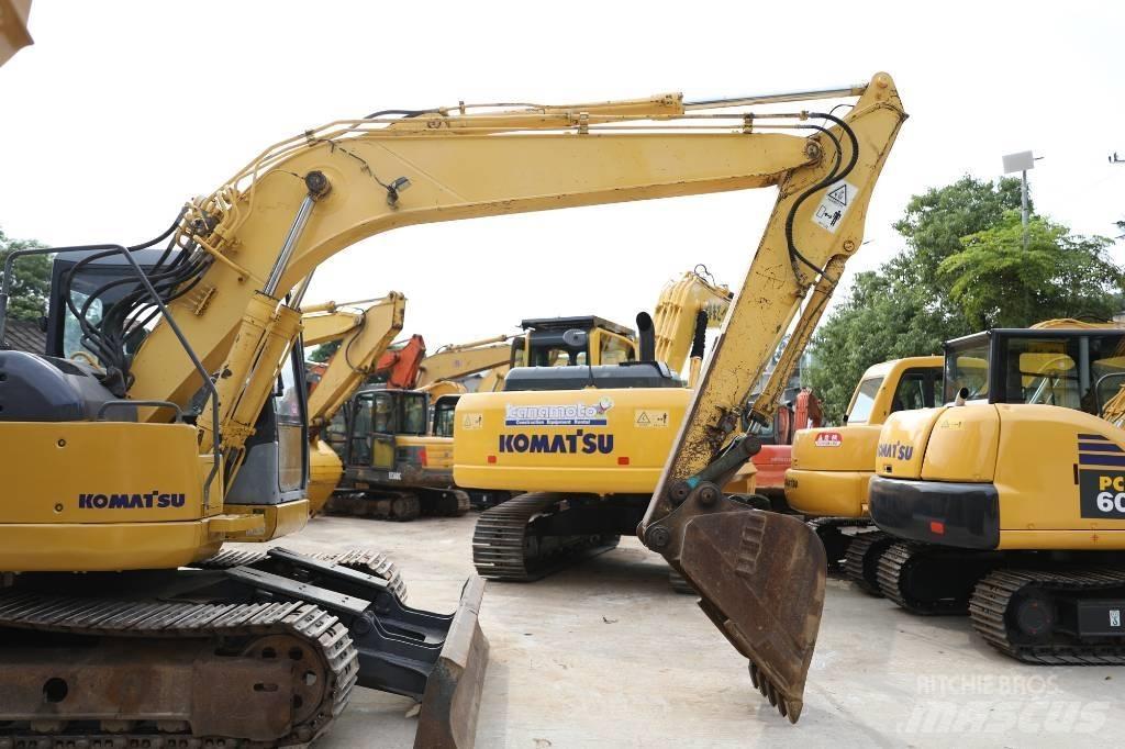 Komatsu PC 128 US 중형굴삭기 7톤-28톤