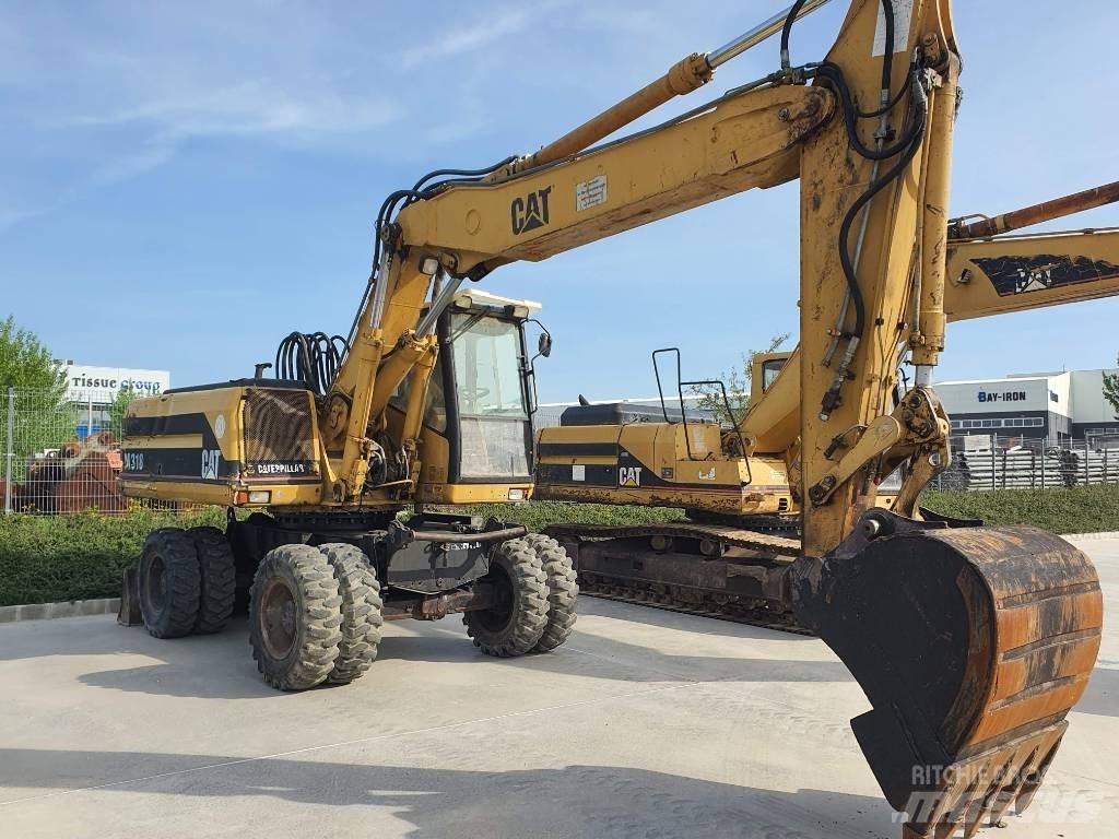 CAT M 318  휠 굴삭기