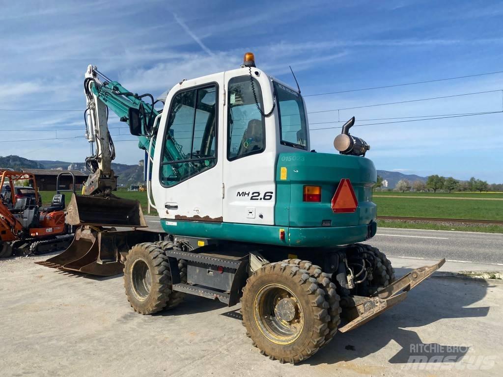 New Holland MH 2.6  휠 굴삭기