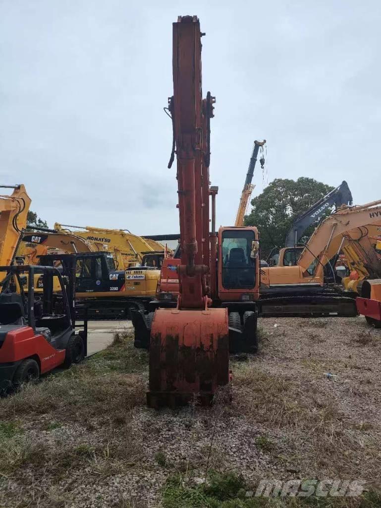 Doosan DH 210 W-7  휠 굴삭기