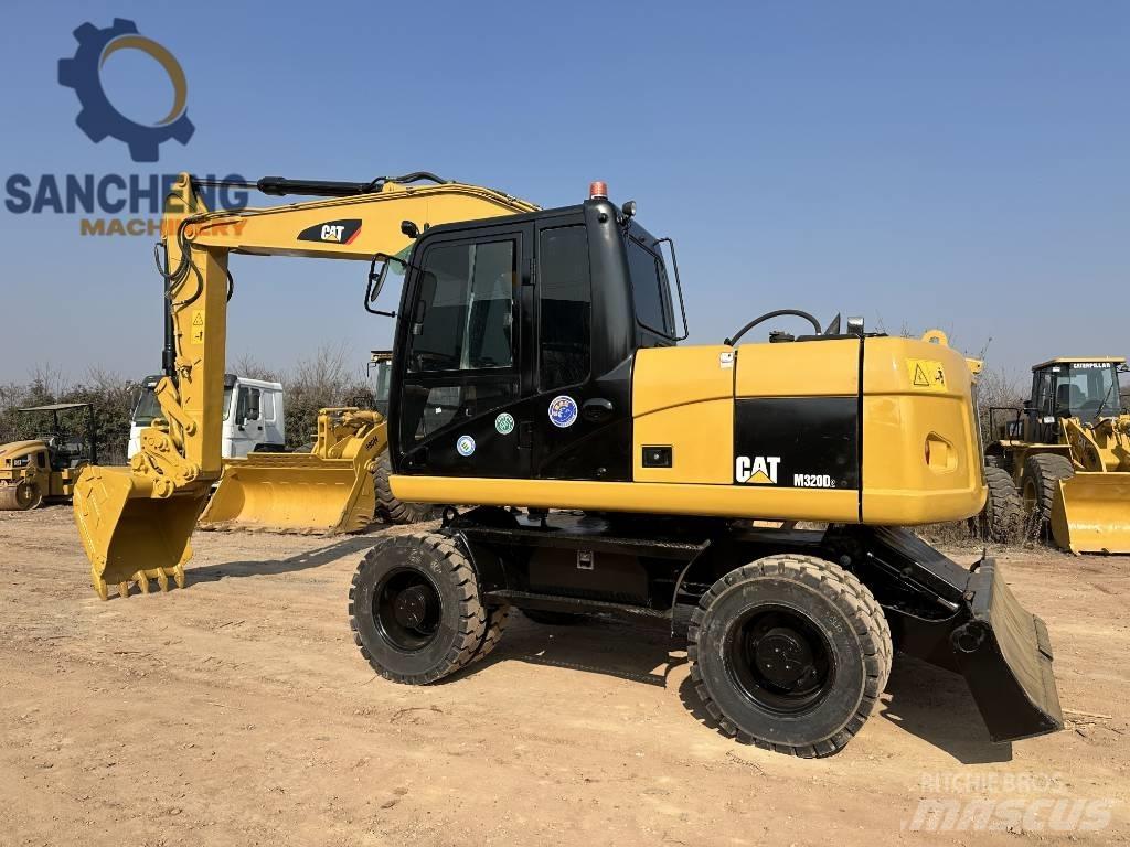 CAT M 320 D  휠 굴삭기