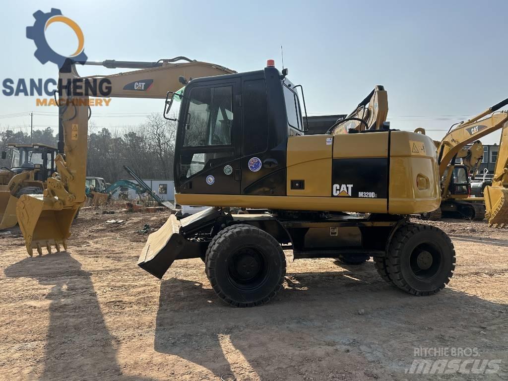 CAT M 320 D  휠 굴삭기