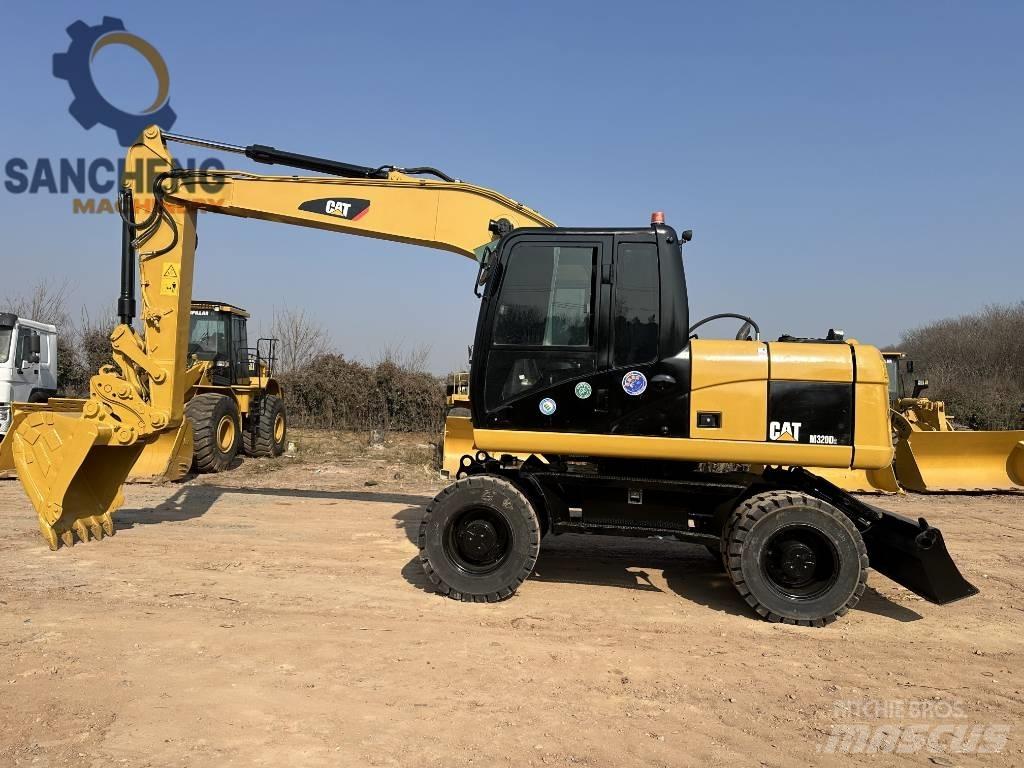 CAT M 320 D  휠 굴삭기