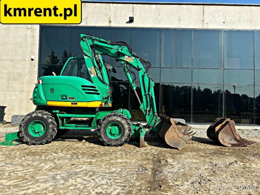 Mecalac 714 MW  휠 굴삭기
