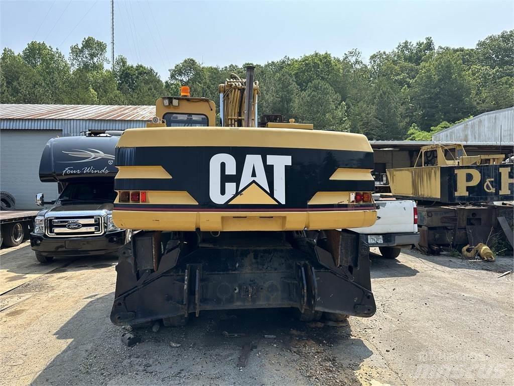 CAT M320  휠 굴삭기
