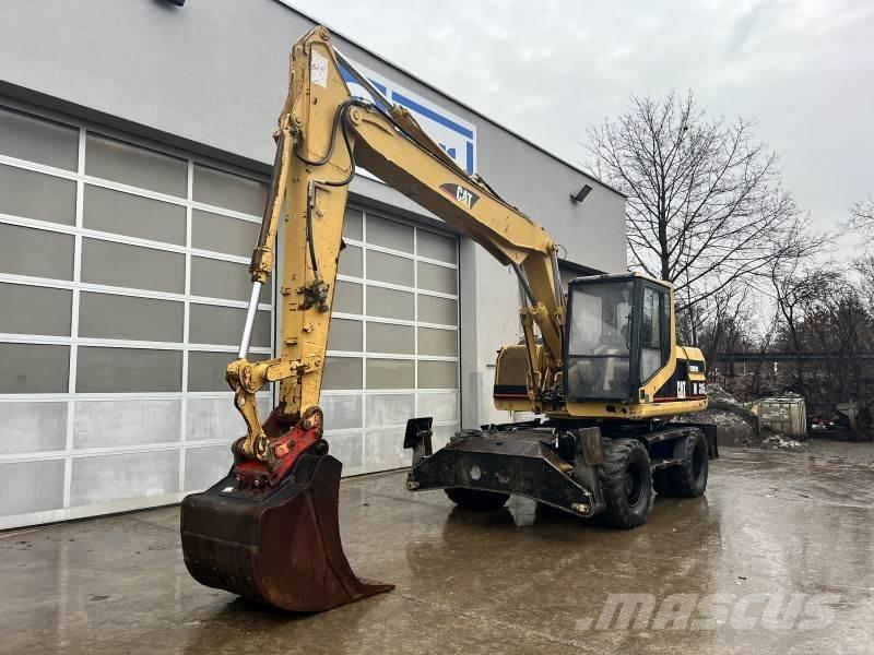CAT M 315  휠 굴삭기