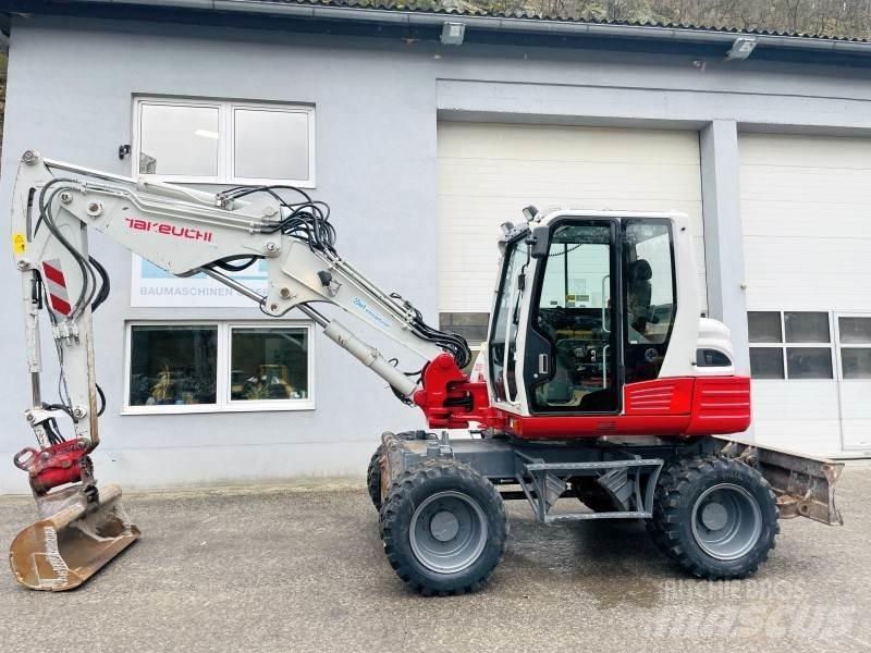Takeuchi TB295W  휠 굴삭기