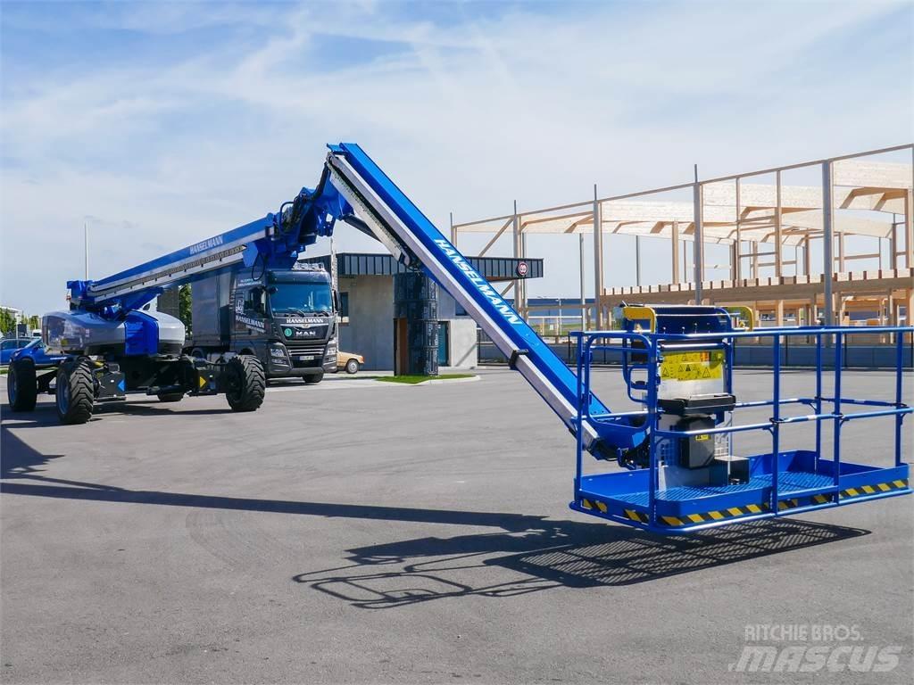 Genie SX-135 XC 견인식 전동이동 리프트