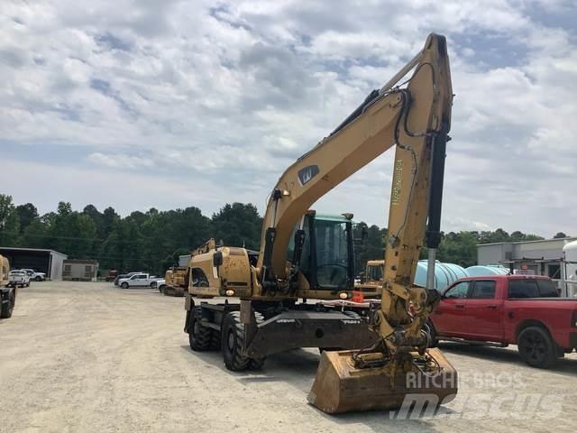 CAT M322D  휠 굴삭기