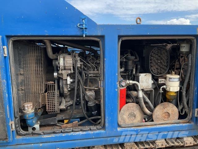 Massenza M18 도로 굴착기