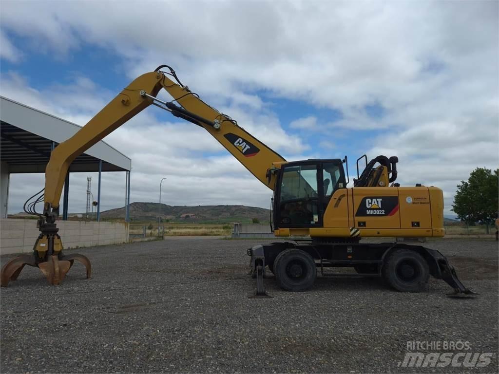 CAT MH3022  휠 굴삭기